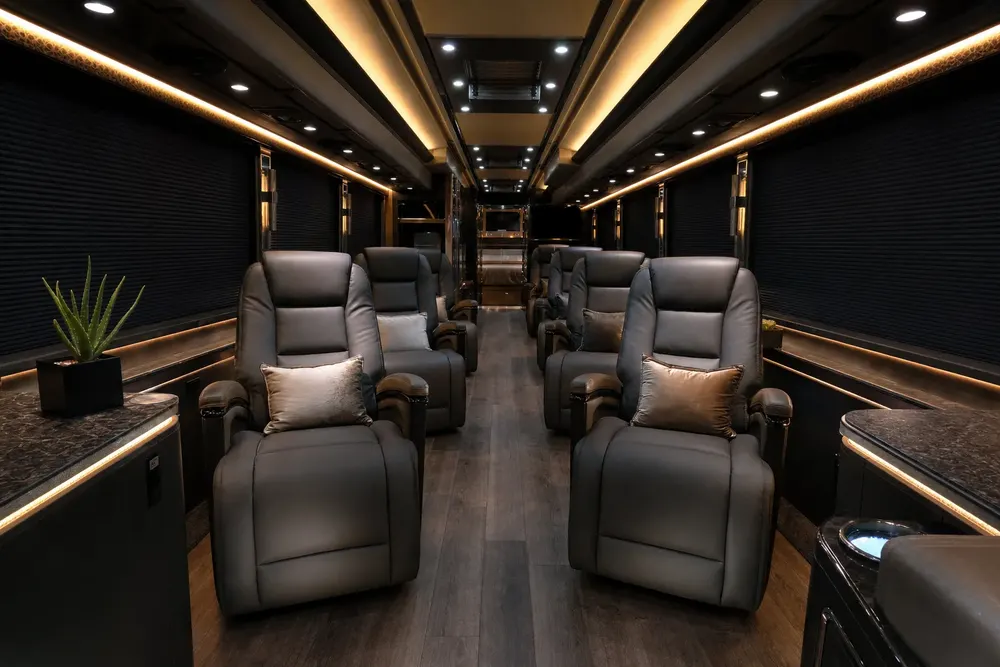 Reclining executive leather seating inside the motor coach cabin