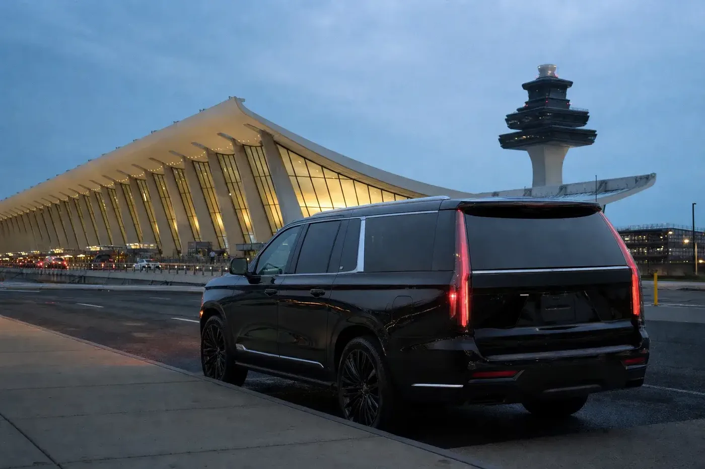 Black Cadillac Escalade at the Washington Dulles International Airport main terminal