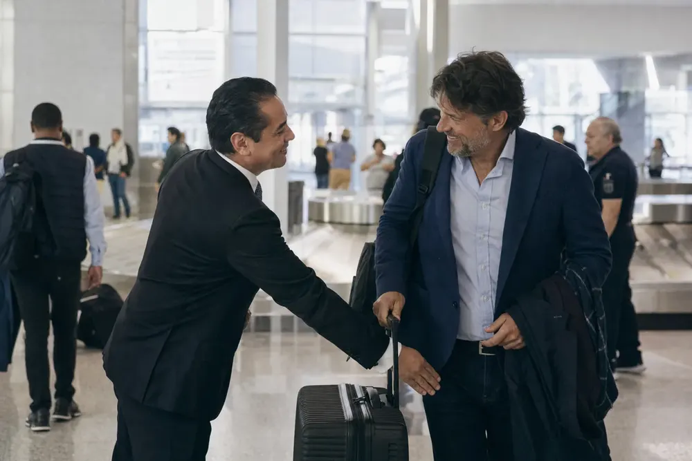 Skyhawk Limousine chauffeur meeting an arriving traveler at BWI Marshall baggage claim