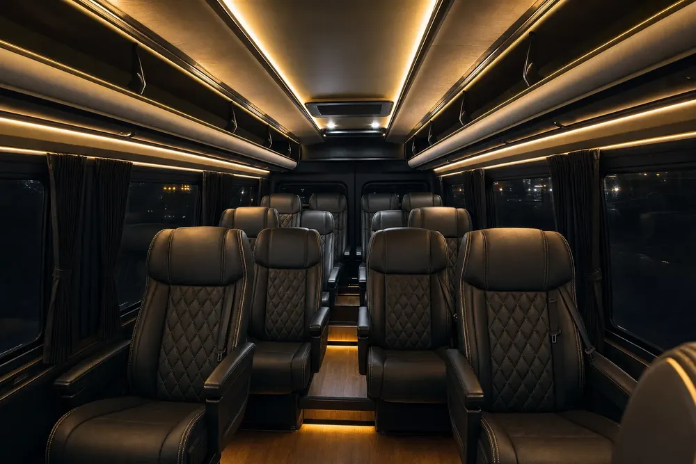 Plush reclining interior of the Skyhawk Limousine Luxury Mini Coach