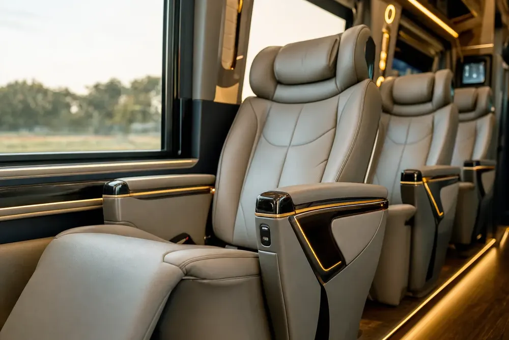 Overhead storage and finishing detail in the mini coach